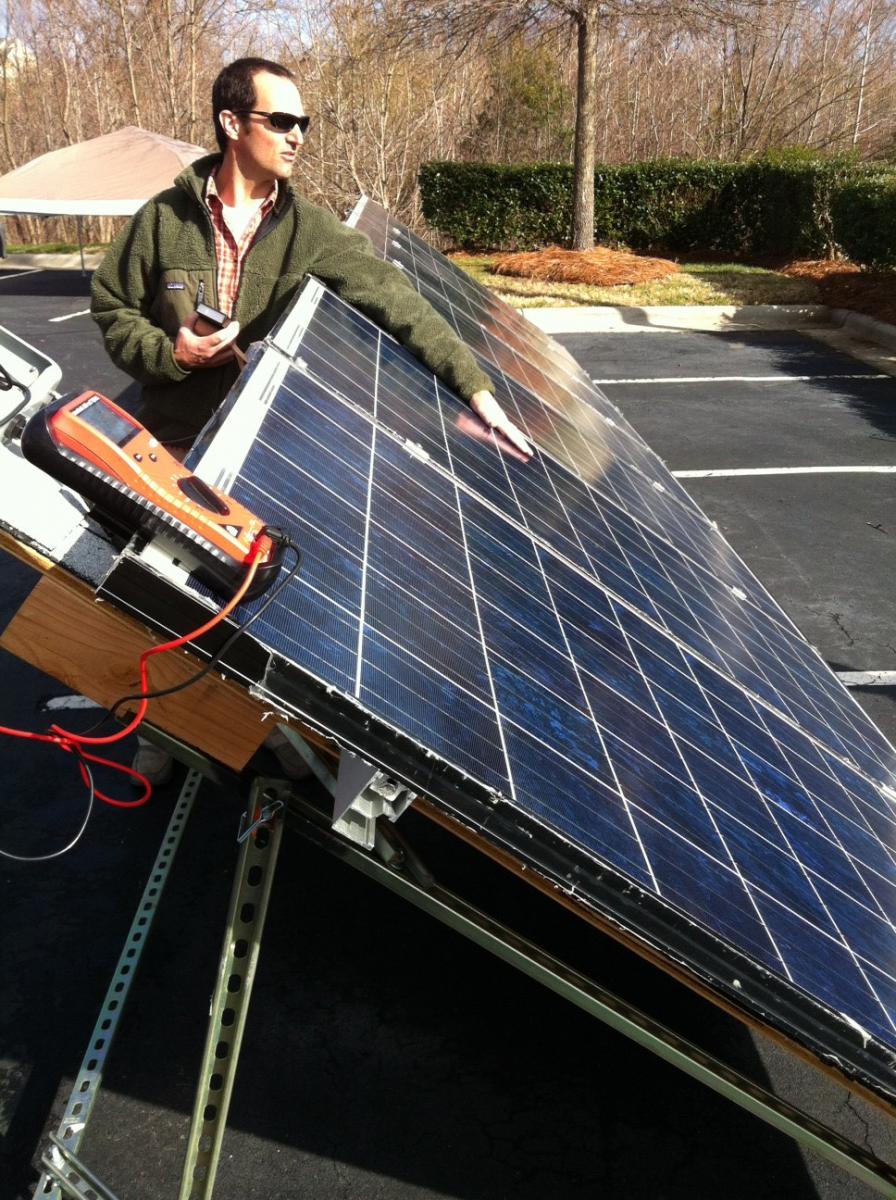 Everblue instructor demonstrates a completed solar array during the Solar PV Installer training course.