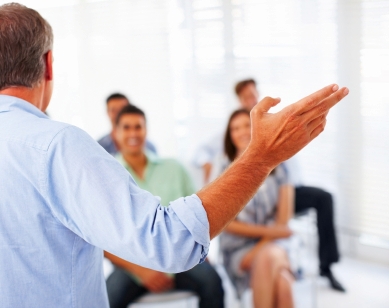 An instructor leads the discussion in the classroom